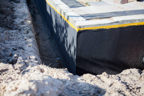 Professional Interior Drainage System technician working in Medford, MN